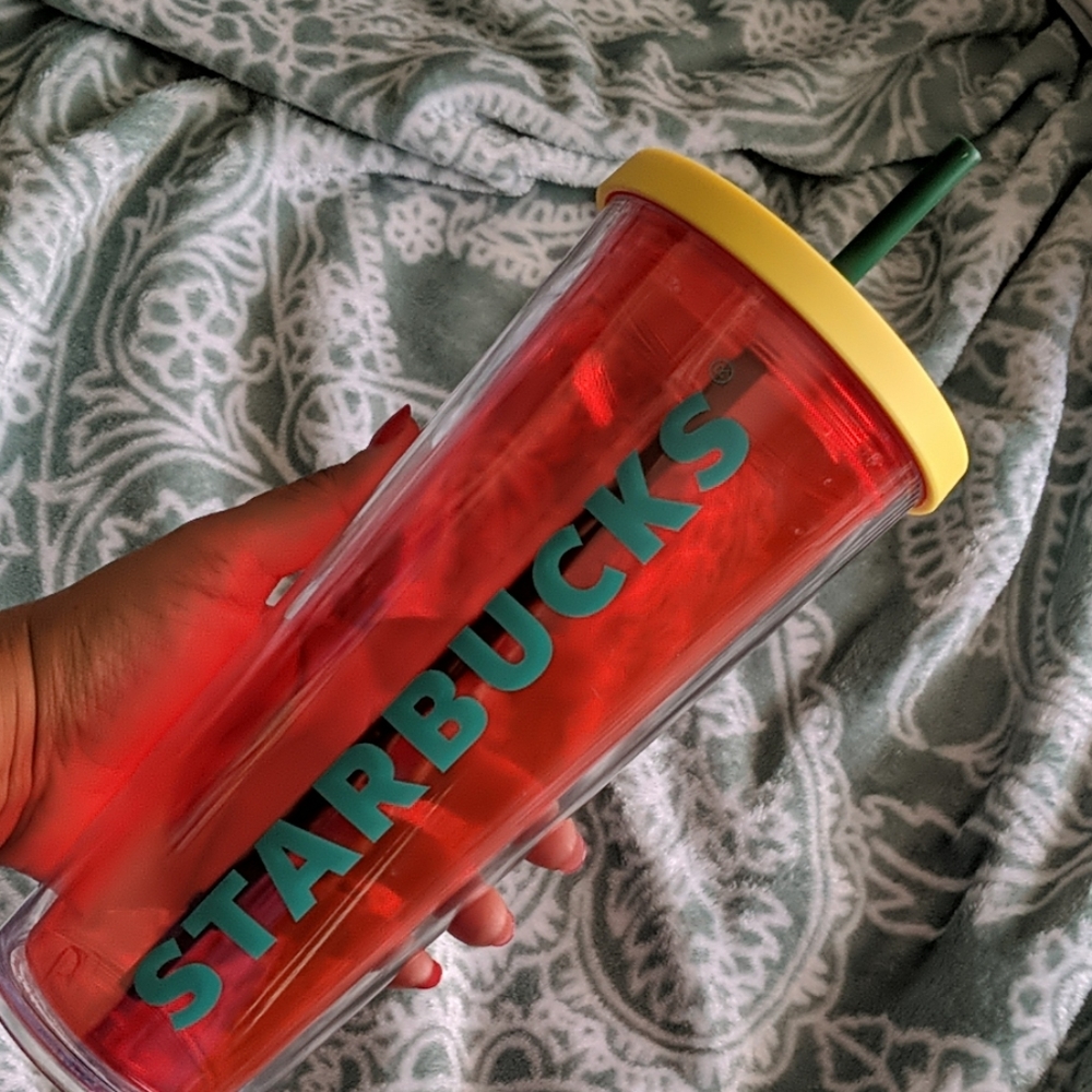 Acrylic glass with lid and straw